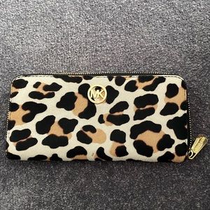 Used micheal kors girls wallet.